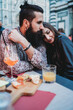 © Connect Images - Couple sharing loving moment in cafe