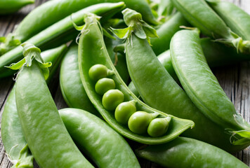 Snap peas on an old wooden board