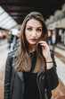 © Connect Images - Woman touching hair in station