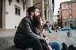 © Connect Images - Man hugging woman from behind on steps