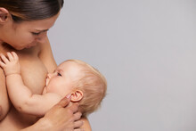 Mother Breastfeeding Baby Boy