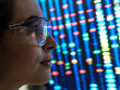 © Connect Images - Genetic Research, female scientist viewing a DNA profile of a human sample on a screen in the lab.