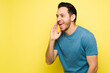 © AntonioDiaz - Attractive man yelling and calling to someone