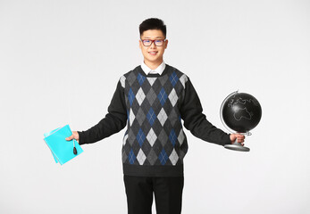 Poster - Male Asian geography teacher on white background