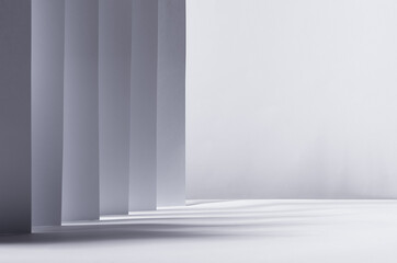 abstract white grey background with contrast perspective of stripes, light and shadow and copy space