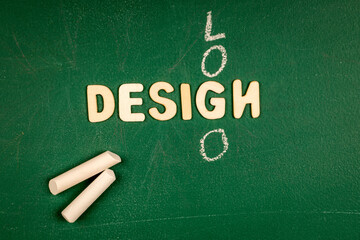 Wall Mural - logo design, business concept. letters of the alphabet on a green chalk board