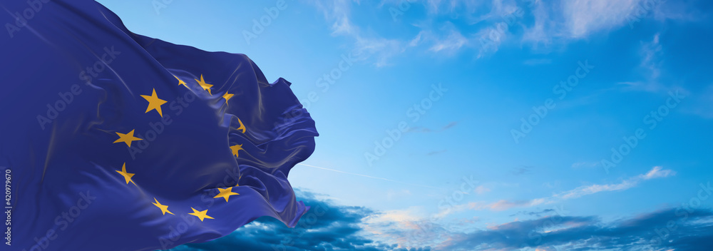 Large flag of The European Union  waving in the wind on flagpole against the sky with clouds on sunny day. 3d illustration - obrazy, fototapety, plakaty 