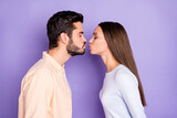 Fototapeta  - Profile side photo of young couple air kiss plump lips romantic date isolated on purple color background