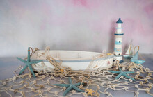 A Little Boat With Starfishes For A Newborn Baby Photo Session