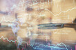 © peshkova - Double exposure of forex chart over coffee cup background in office. Concept of financial analysis and success.