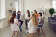 © Studio Romantic - Young women telling their stories in therapy session or support group meeting. Female team talking, sharing news, discussing life situations, giving each other advice, working out solutions together