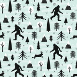 Fototapeta Dinusie - Bigfoot and jackalope seamless pattern design set in winter outdoor wilderness