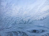 Fototapeta Sypialnia - Beautiful frosty patterns on the window. Natural textures.