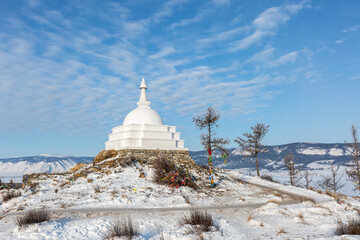 White Buddhist stupa on  Ogoy Island, Baikal Lake, Russia