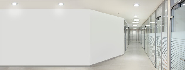 Empty bank office hall with glass walls and doors