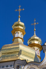 Wall Mural - Beautiful domes of Christian Church on blue sky background