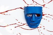 Blue Face Mask With Blood On White