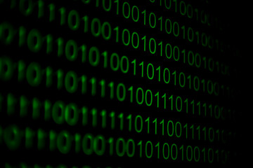 numerical continuous code in green color, abstract web data in binary code.programming code abstract