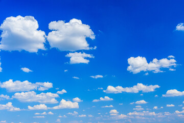 White fluffy clouds in the blue sky