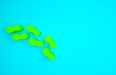 Wall Mural - Green Human footprints shoes icon isolated on blue background. Shoes sole. Minimalism concept. 3d illustration 3D render