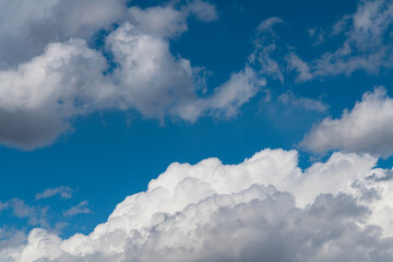 Wall Mural - Beautiful blue sky with fluffy white clouds. Sky clouds backgrounds.