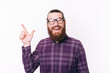 © Vulp - Portrait of bearded man in shirt wearing eyeglasses and pointing at corner