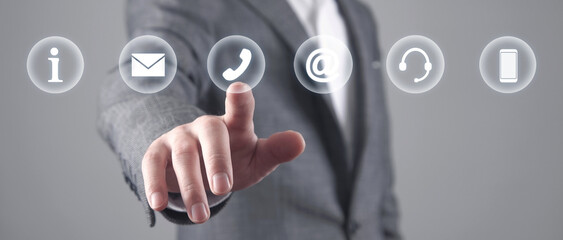 Wall Mural - man touching contact symbols. internet. communication