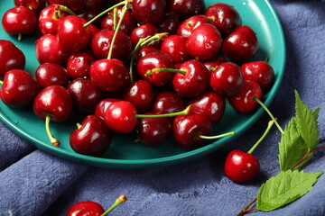 Wall Mural - cherry fruit with leaf