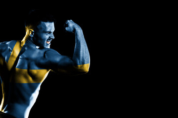 Wall Mural - Sweden flag on handsome young muscular man