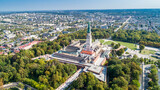 Fototapeta Miasto - Poland, Częstochowa. Jasna Góra fortified monastery and church on the hill. Famous historic place and 
Polish Catholic pilgrimage site with Black Madonna miraculous icon. Aerial view in fall.