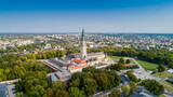 Fototapeta Krajobraz - Poland, Częstochowa. Jasna Góra fortified monastery and church on the hill. Famous historic place and 
Polish Catholic pilgrimage site with Black Madonna miraculous icon. Aerial view in fall.