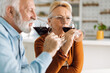 © Goran - Mature couple drinking wine at home