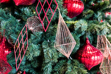 Close-up Of Christmas Decorations Hanging On Tree