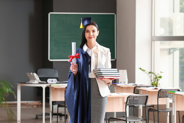 Portrait of female teacher in classroom