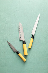 Wall Mural - Set of knives on color background