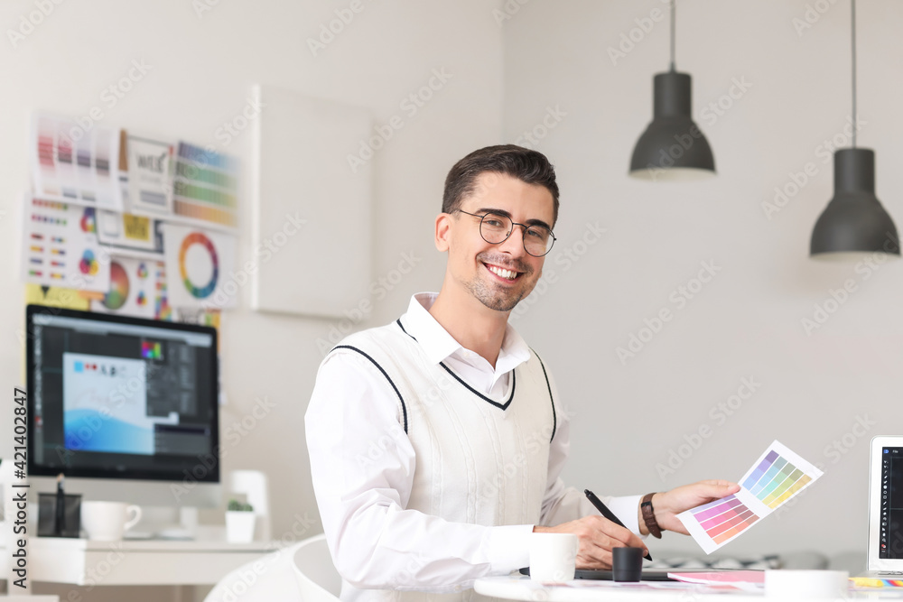 Graphic designer working in office