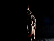 Close-up Of Buddha Statue In Darkroom