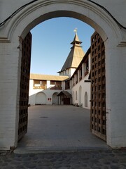 White stone walls and towers of an ancient fortress