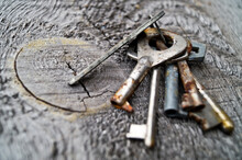 Close-up Of Rusty Keys On Table