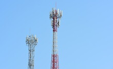 Low Angle View Of Communications Tower Against Clear Blue Sky