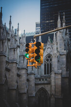 Low Angle View Of Road Signal Against Church In City