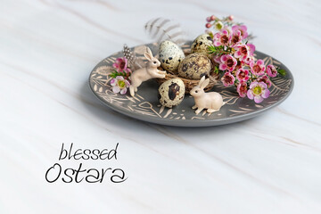 Wall Mural - Blessed Ostara greeting card. plate with Eggs in nest, cute rabbits, flowers. symbol Ostara holiday. festive spring season. wicca pagan tradition. 