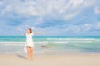 © siraphol - Portrait beautiful young asian woman relax smile leisure around beach sea ocean