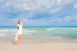 © siraphol - Portrait beautiful young asian woman relax smile leisure around beach sea ocean