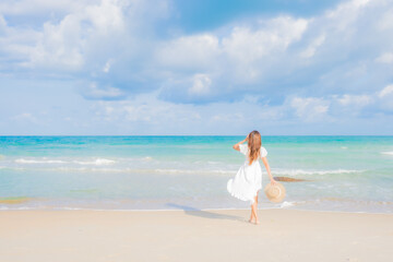 Portrait beautiful young asian woman relax smile leisure around beach sea ocean