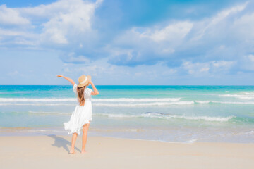 Portrait beautiful young asian woman relax smile leisure around beach sea ocean