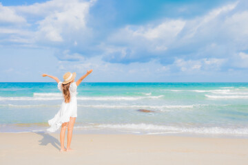 Portrait beautiful young asian woman relax smile leisure around beach sea ocean