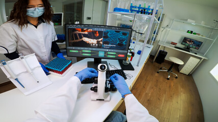 Wall Mural - fpv of biotechnology scientist researching in laboratory using microscope analysing various bacteria