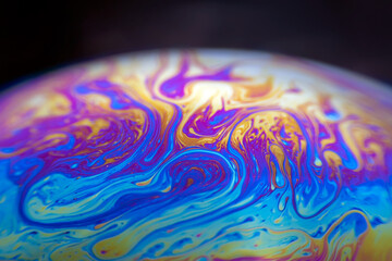 Wall Mural - colorful psychedelic soap bubble refractions pattern macro. colorful macro soap bubble iridescence
