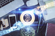 © peshkova - Double exposure of blockchain theme hologram over table with phone. Top view. Crypto technology concept.